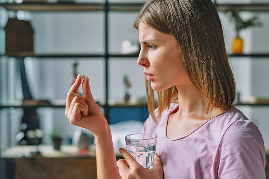 Woman Taking Pill